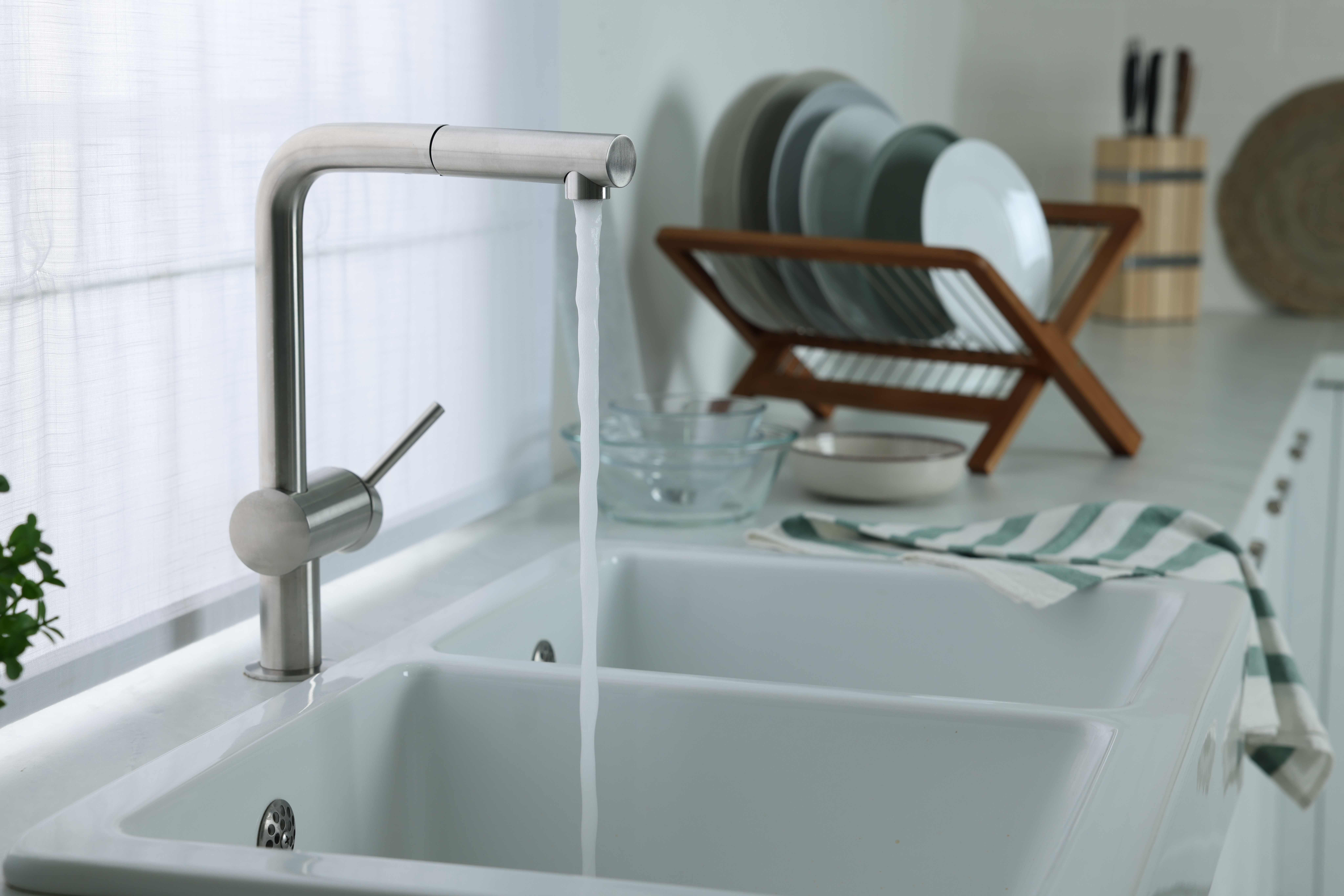 water flowing from kitchen tap
