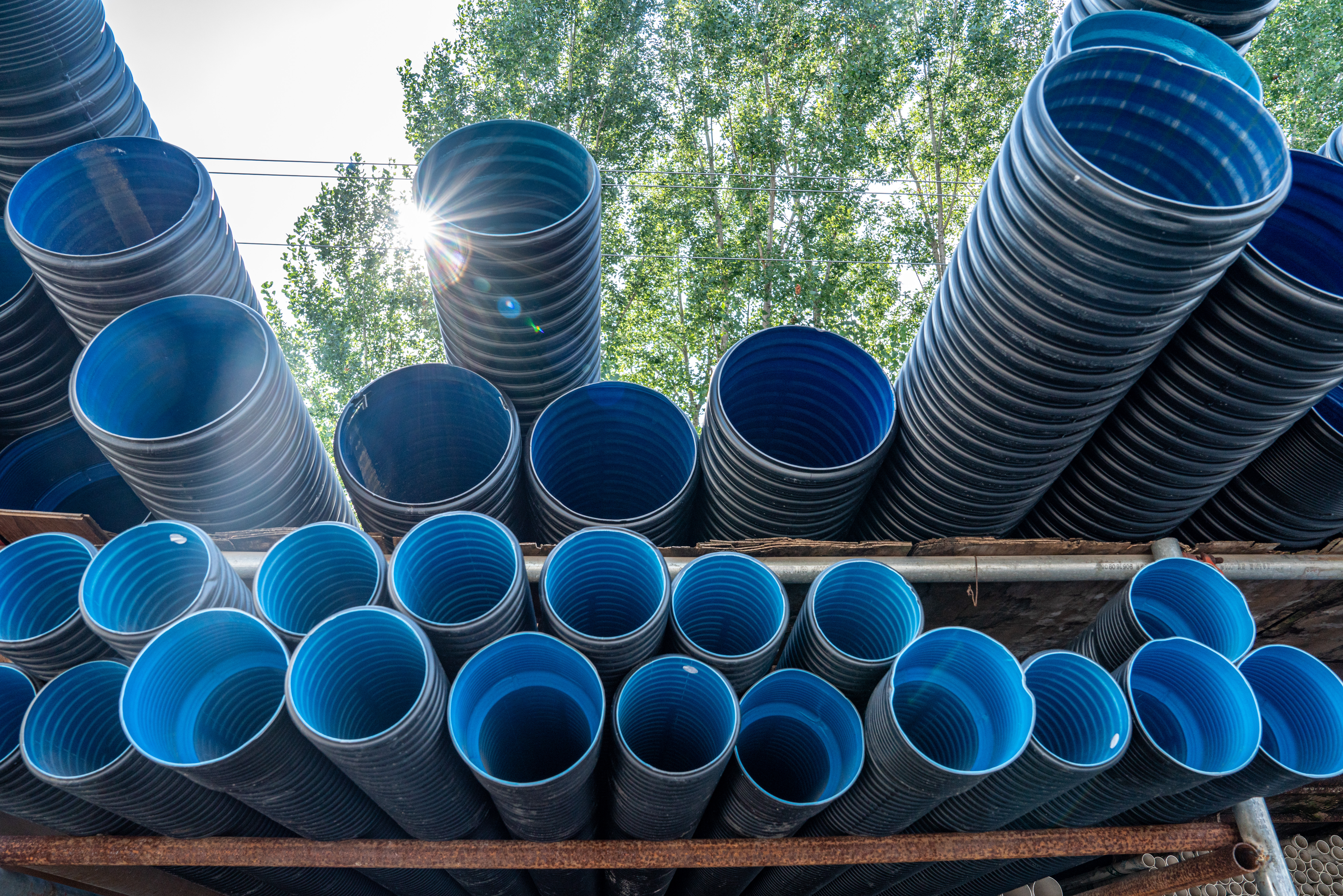 A stack of PVC water pipes