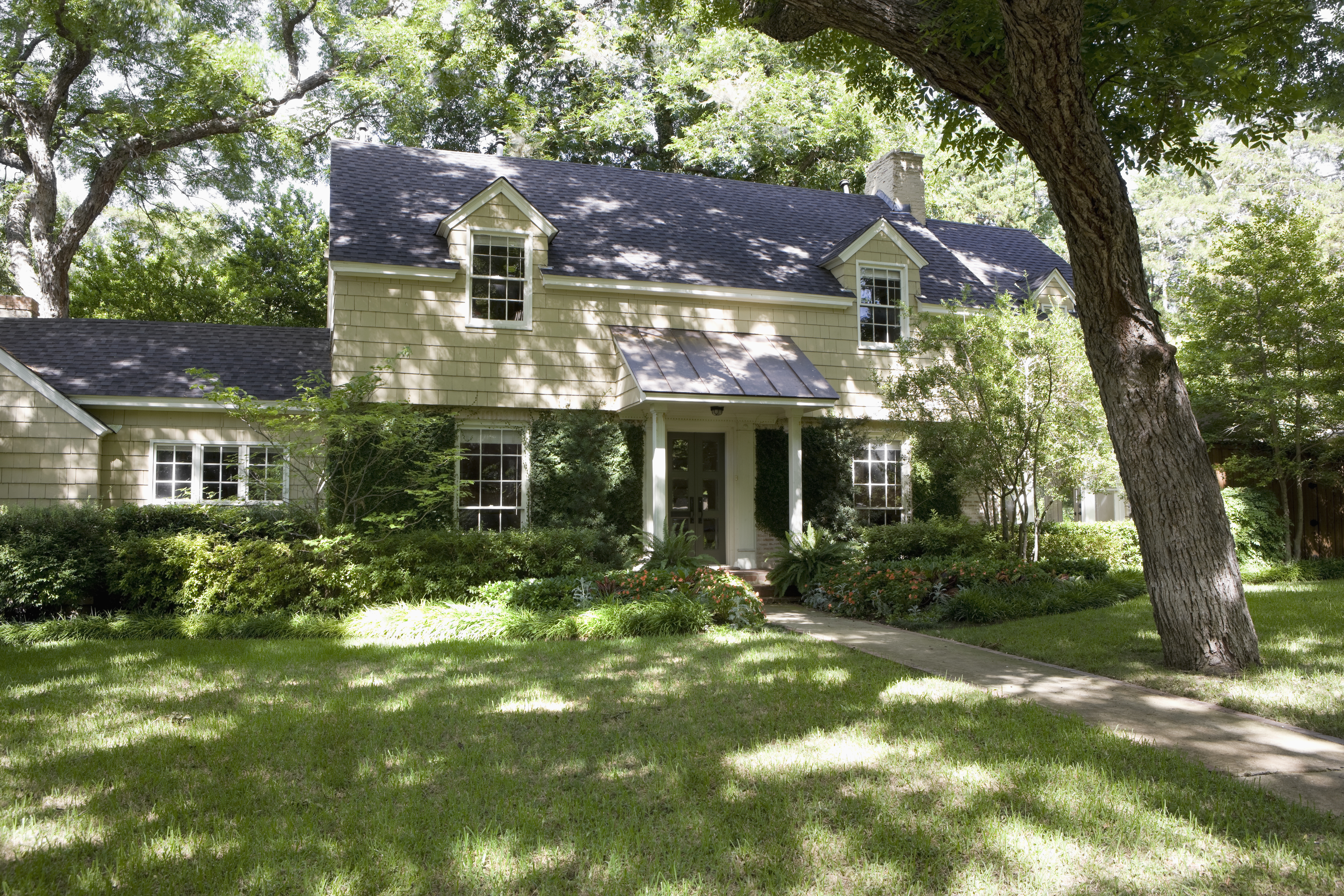 The exterior of a beautiful house with lawn