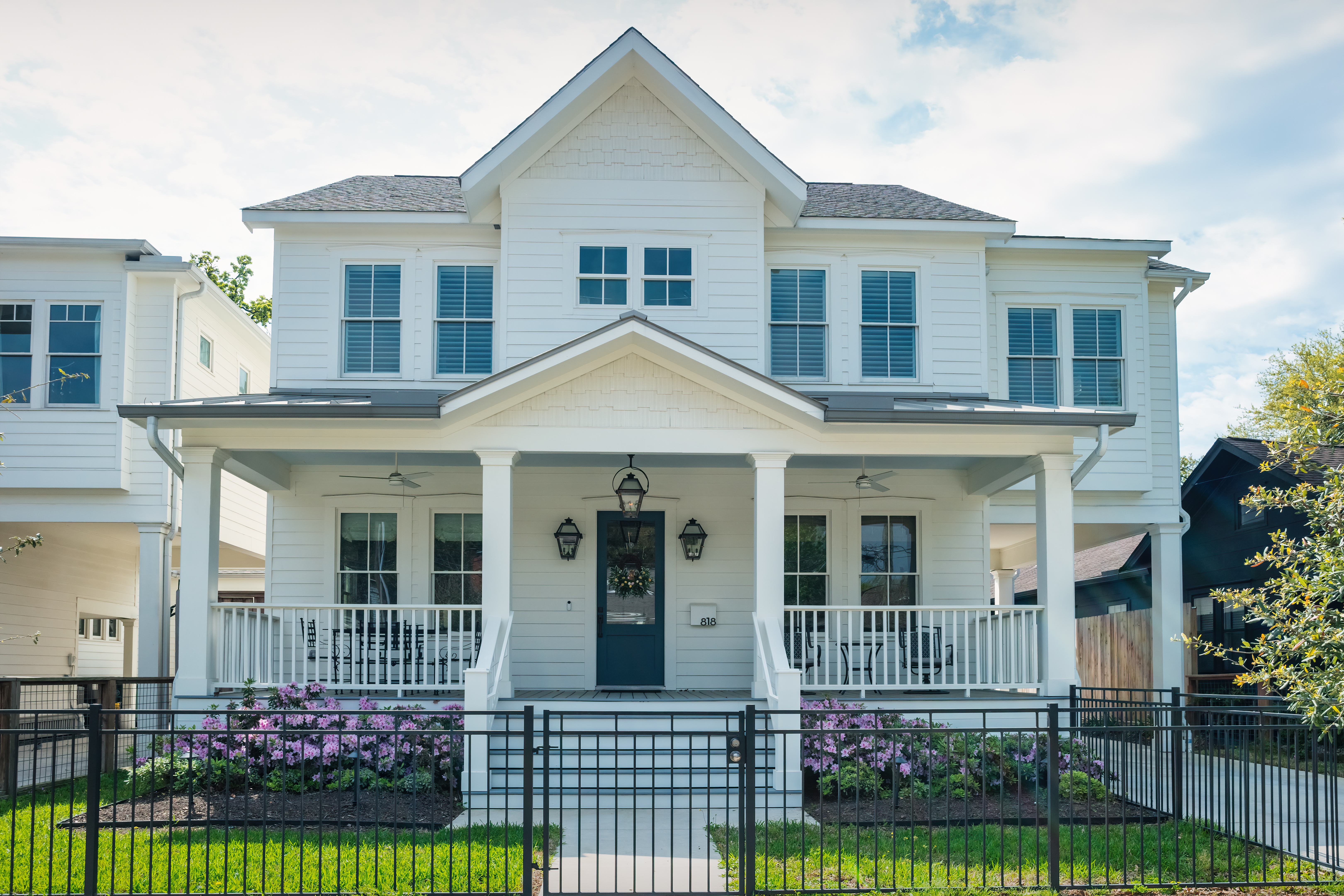 white house with shingle roof in houston