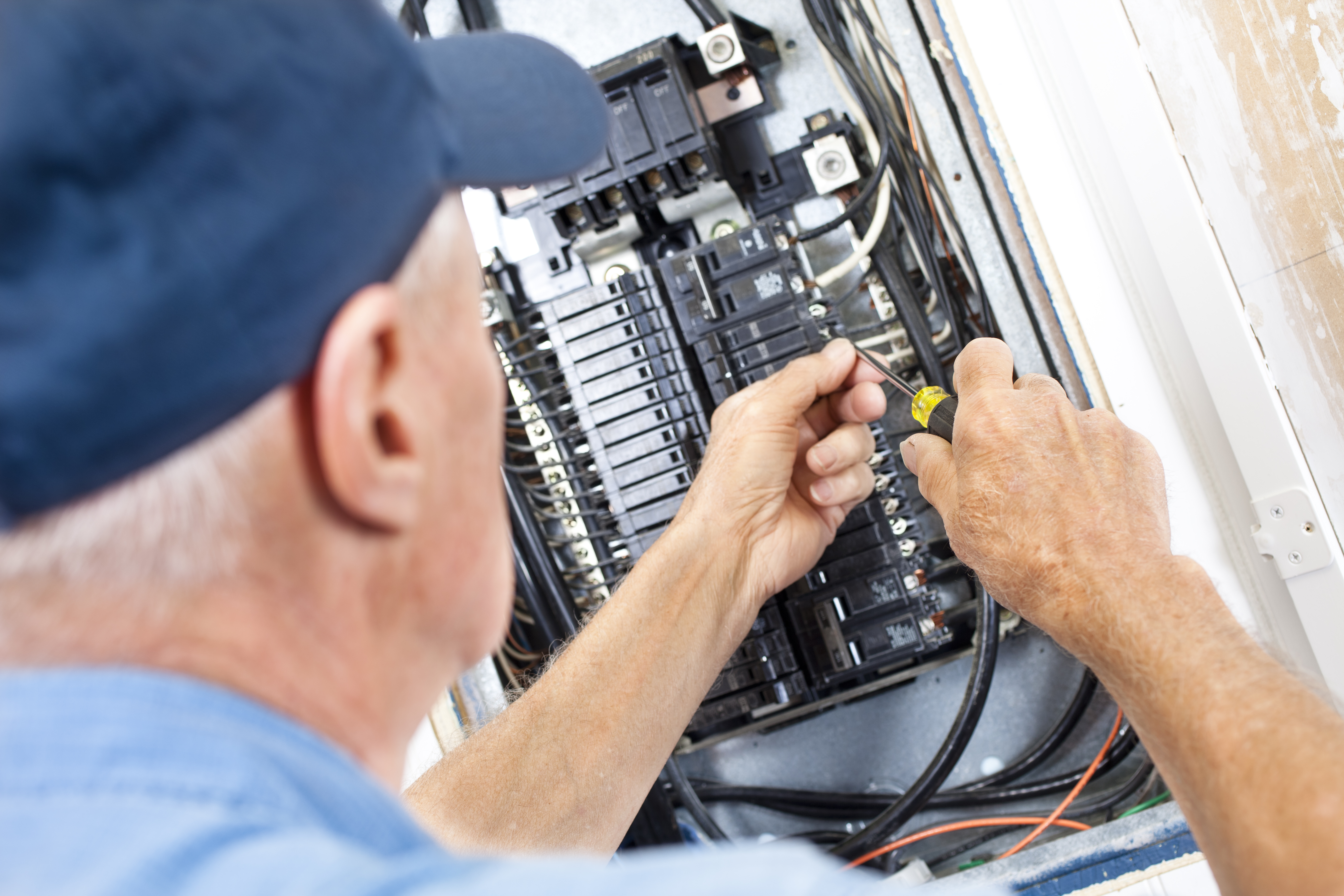 Electrician doing electrical work 