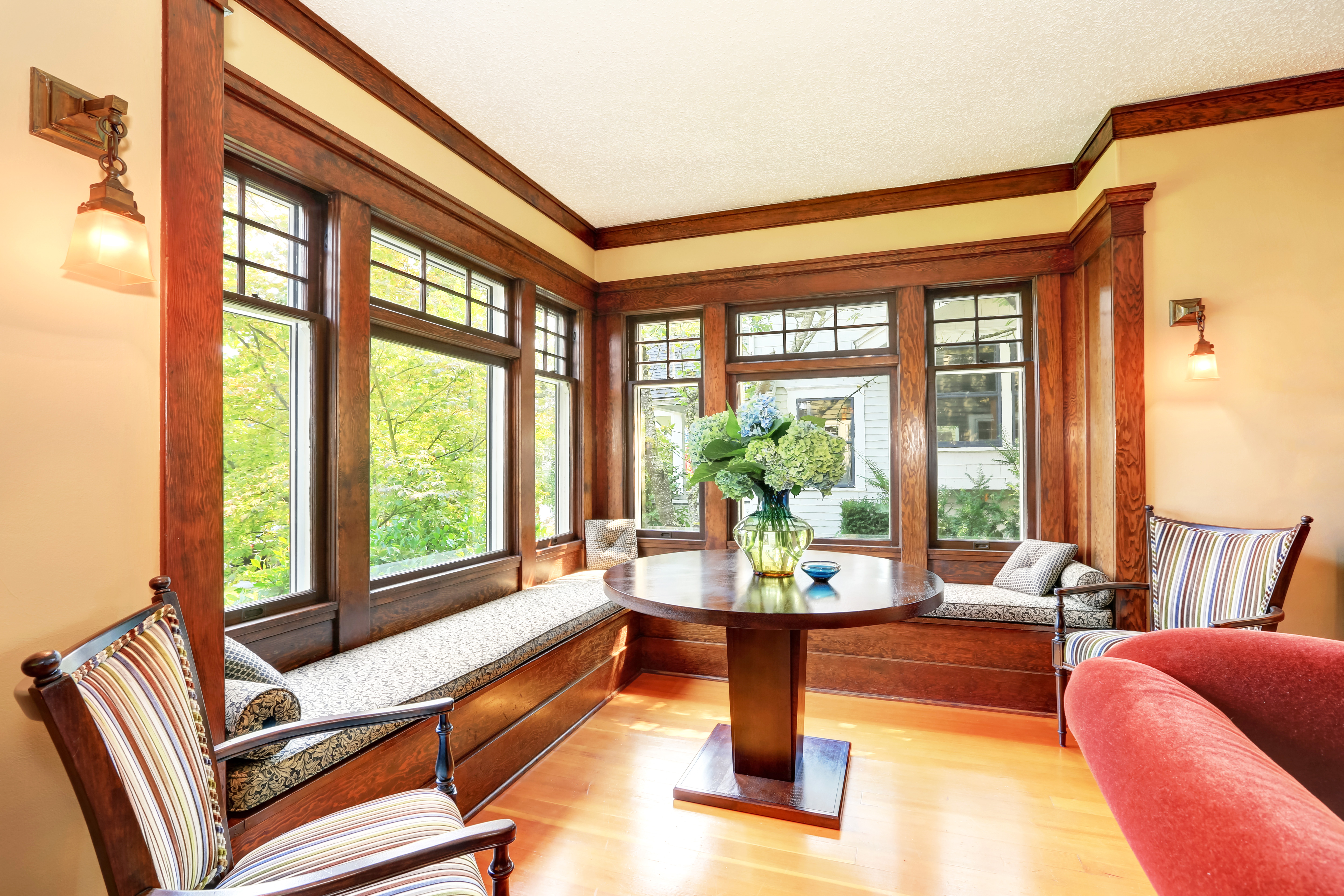 Wood crown molding installed in a cozy window nook