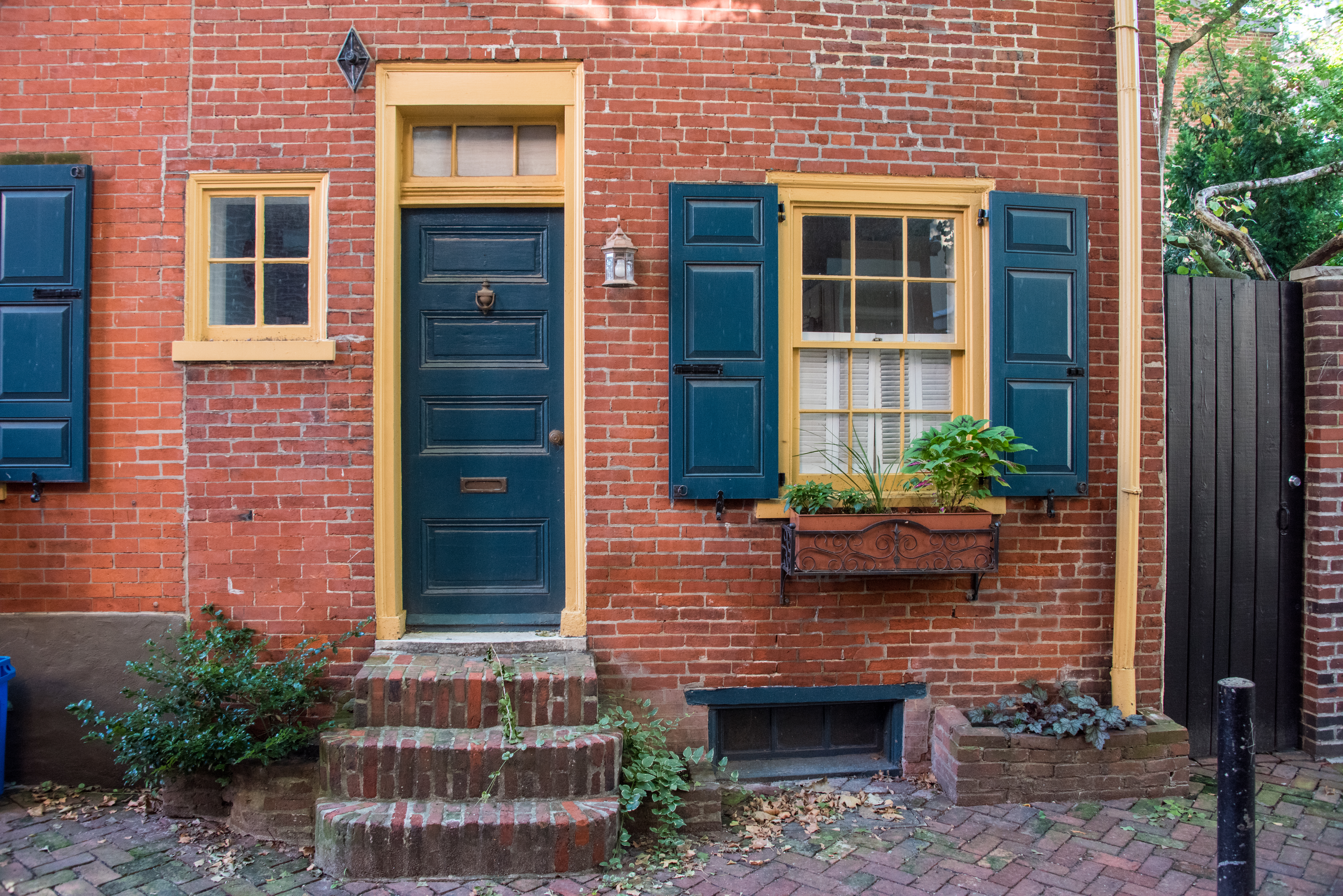 A terraced brick townhouse in Philadelphia, PA