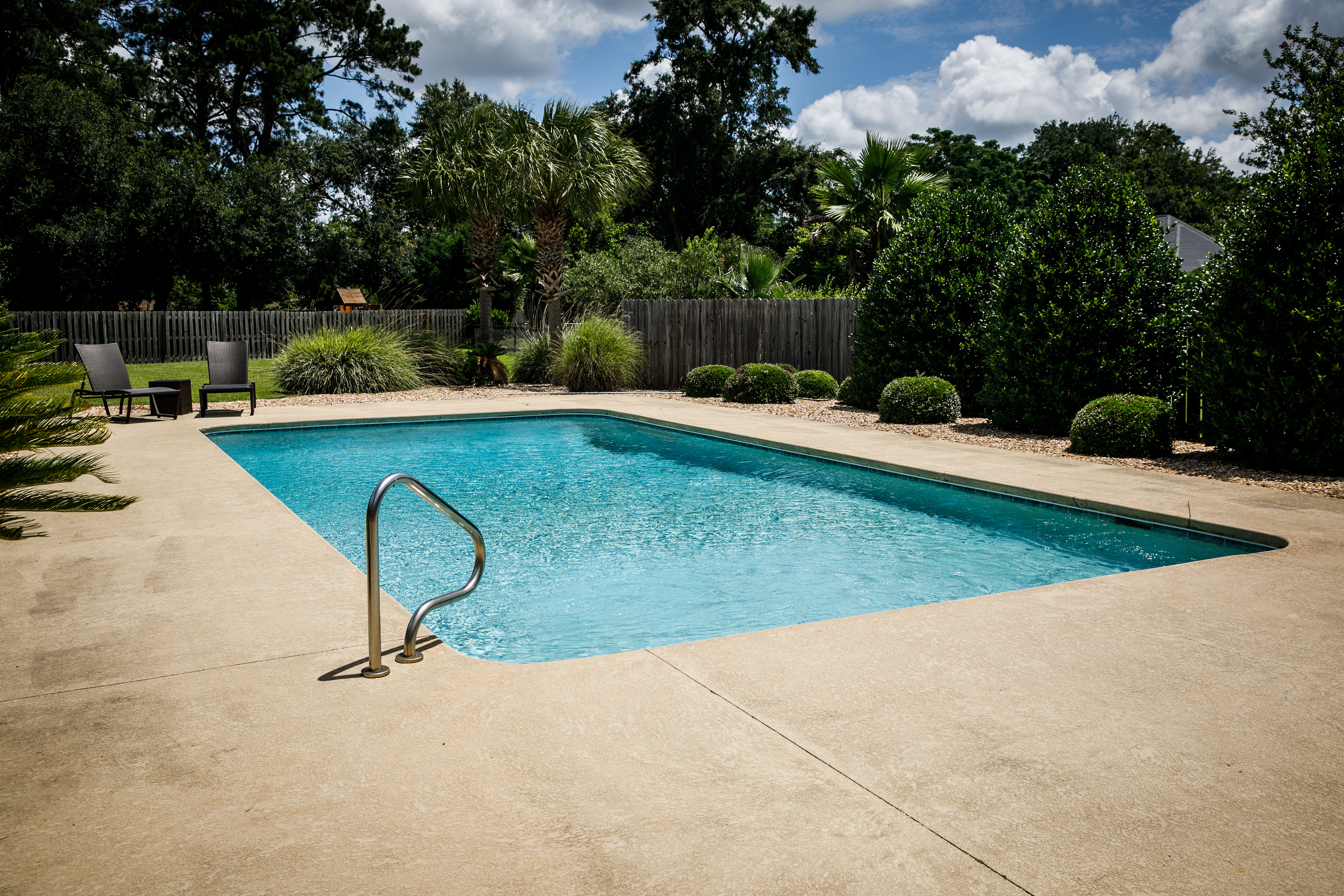 Large swimming pool in a backyard 