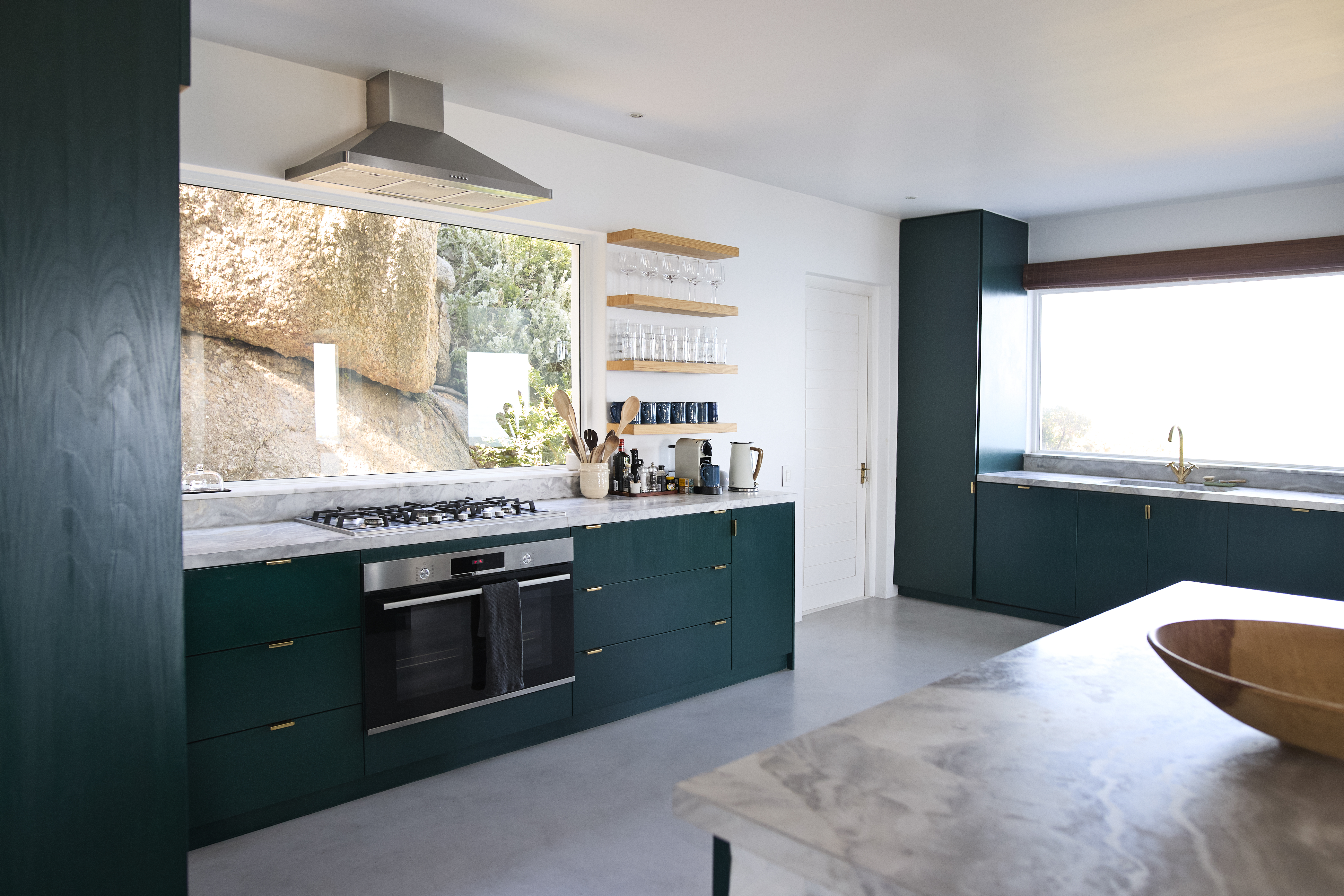 A contemporary kitchen with lots of light