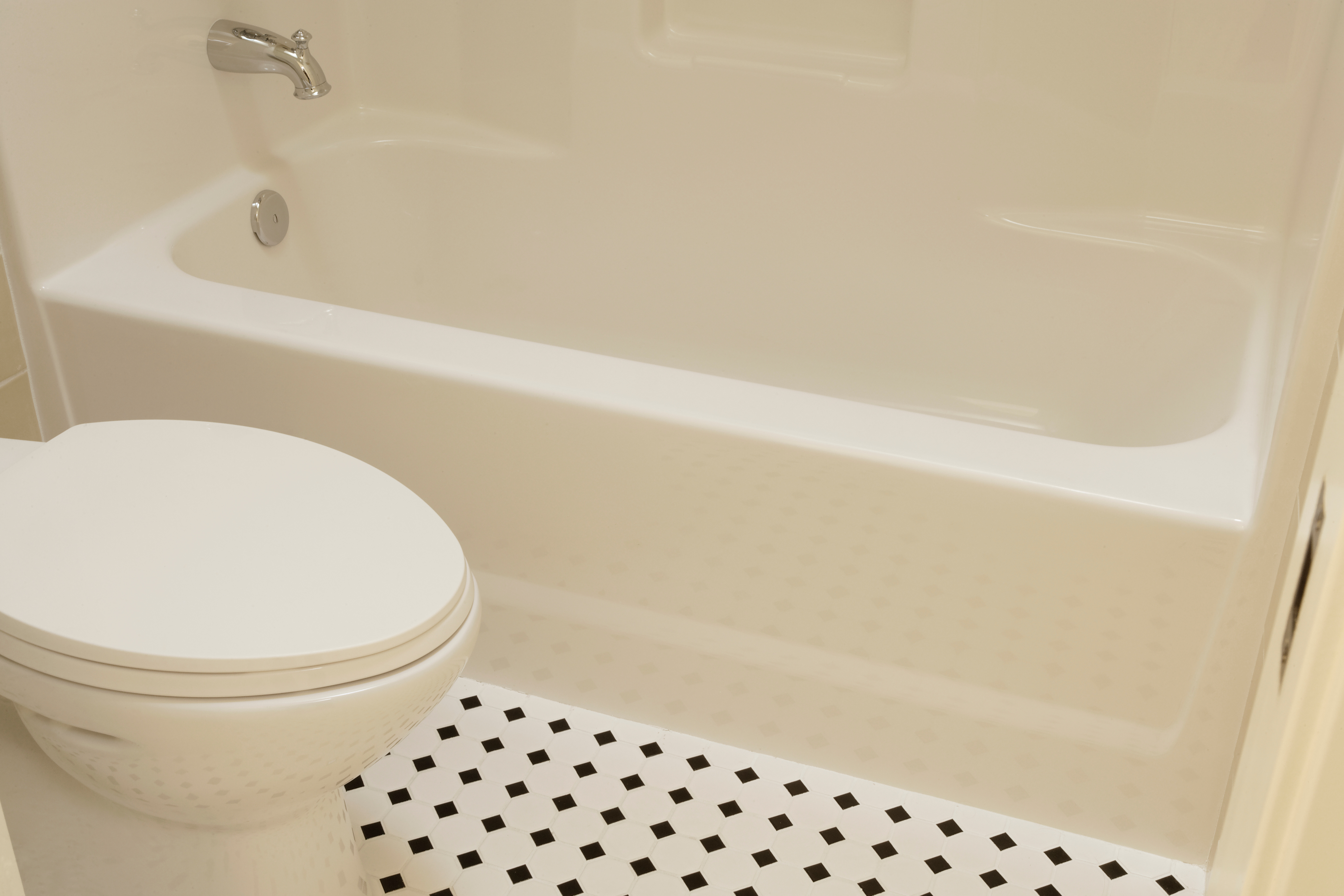 bathroom with acrylic tub