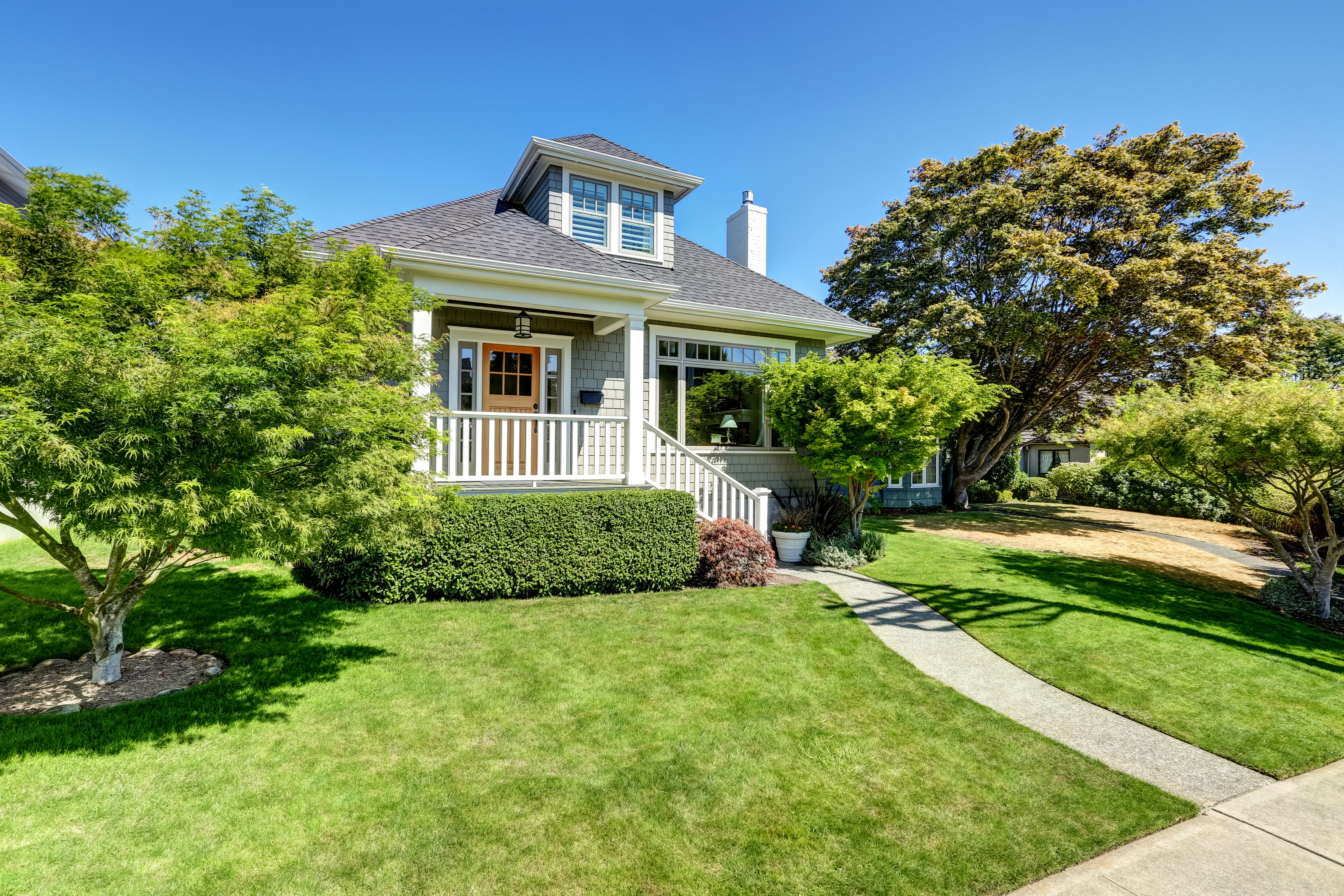 Single-family home with a lush lawn