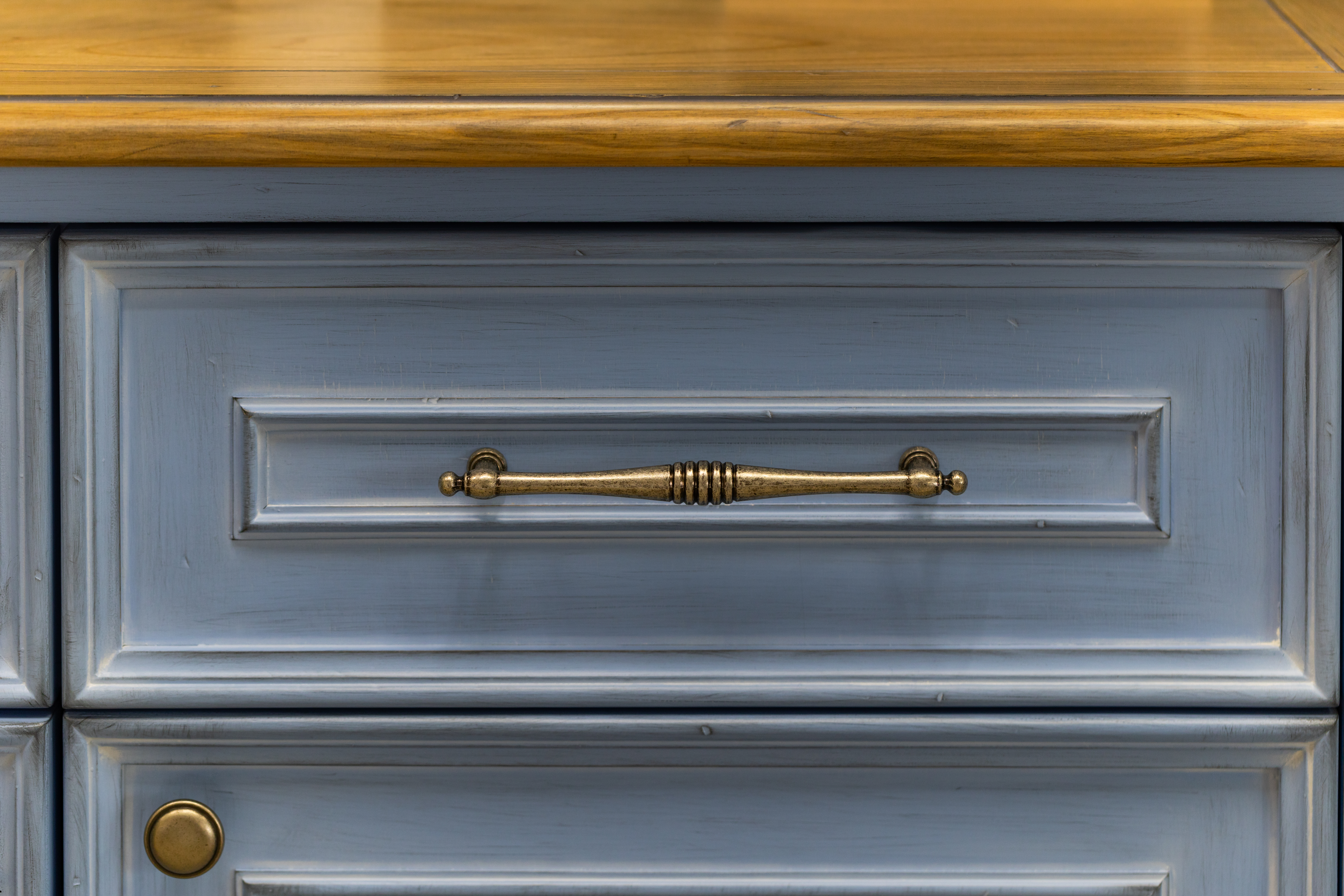 A vintage grey-blue dresser drawer 