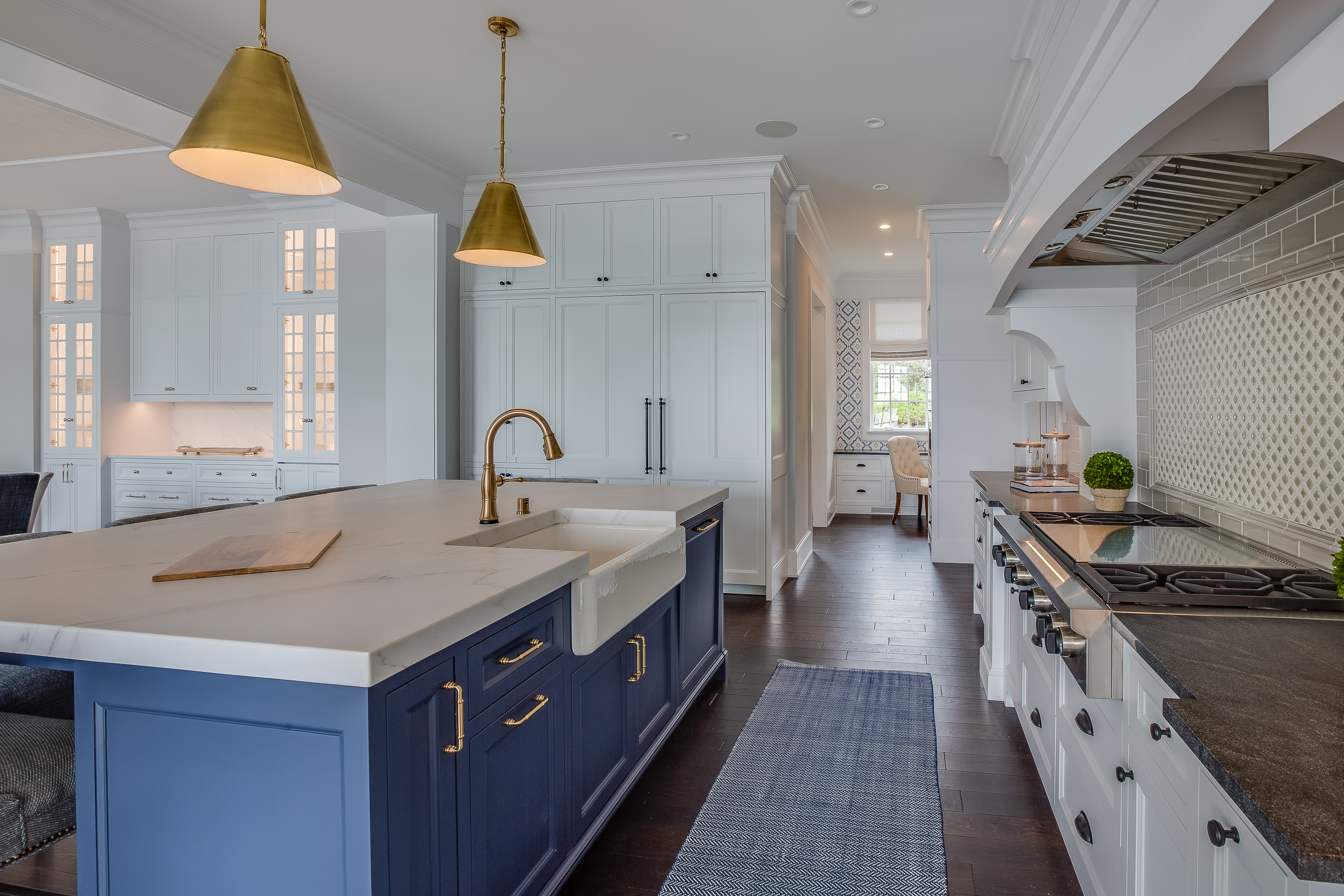A large kitchen with a farmhouse sink