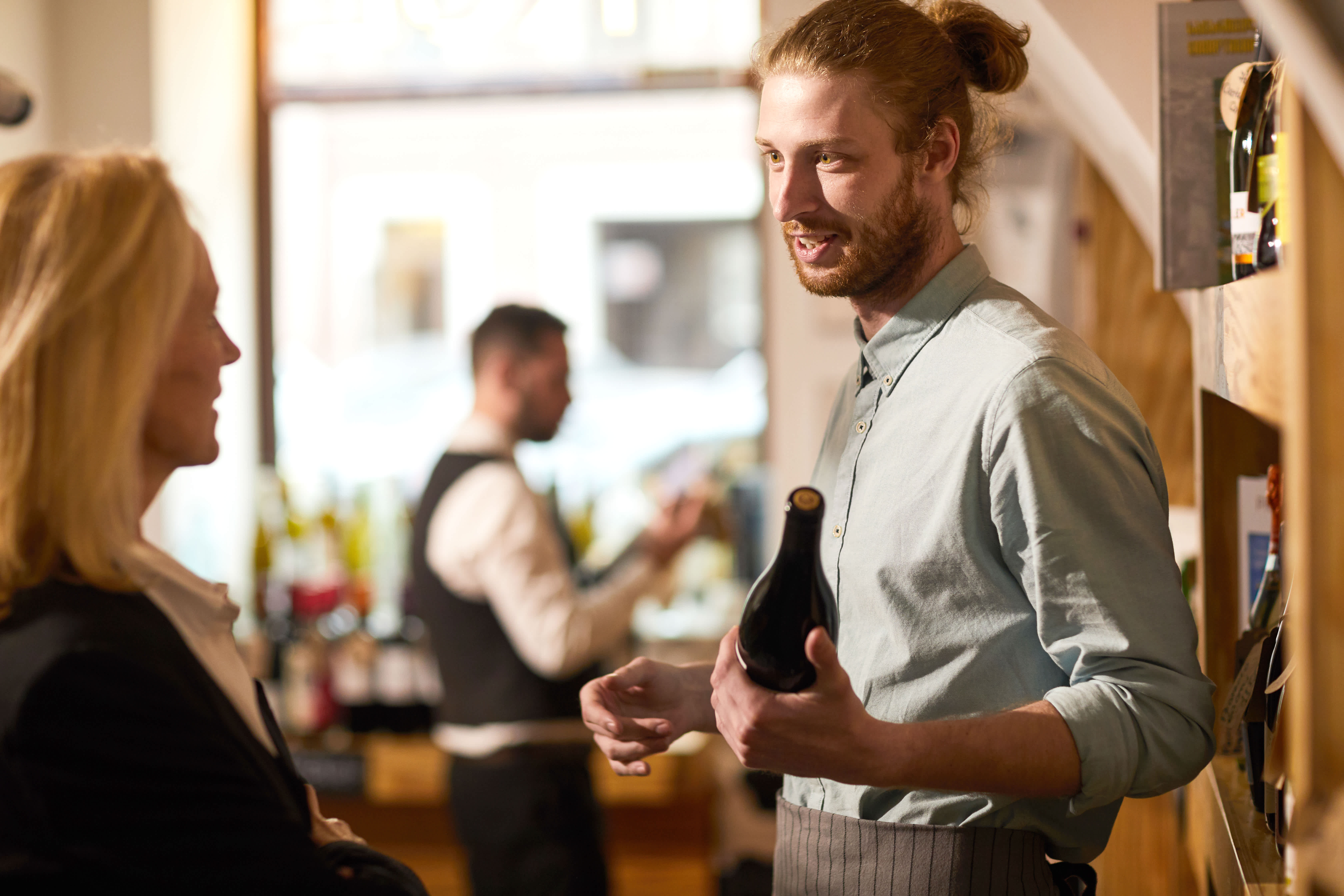 Anora brand - person purchasing wine