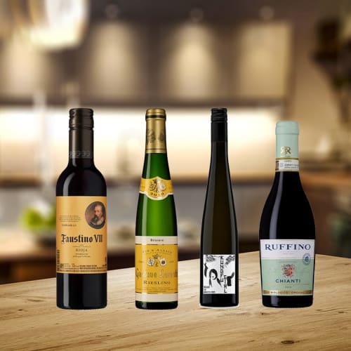 Faustino VII, Gustave Lorentz Riesling Réserve, Kung Fu Girl Riesling, Ruffino Chianti Organic på bord