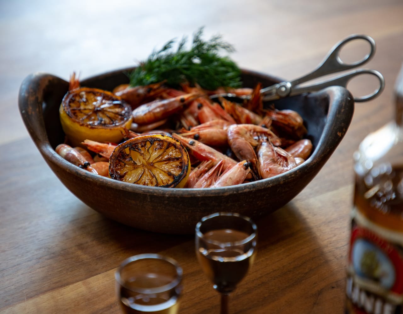 Linie Aquavit with a seafood dish