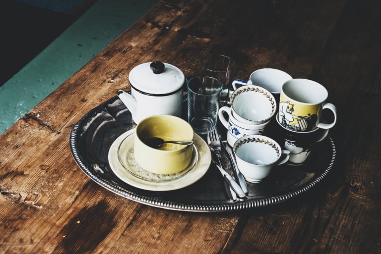 Empty coffee cups on a tray