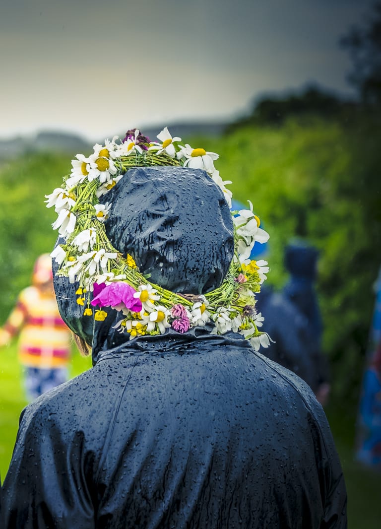 garland in head in a rain