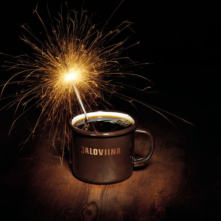 Jaloviina coffee mug on a table with a sparkler