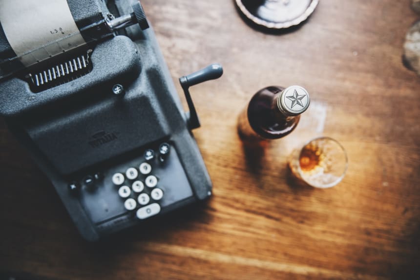 Jaloviina bottle with glass and old cash machine
