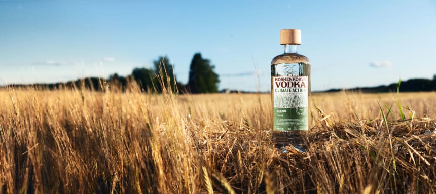 Koskenkorva Vodka Climate Action Bottle on a field