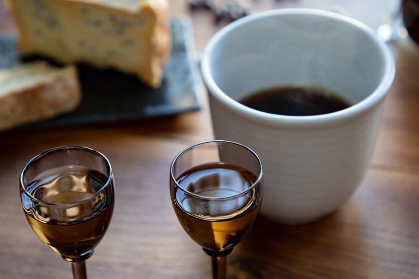 Linie Aquavit in glasses with coffee and cheese