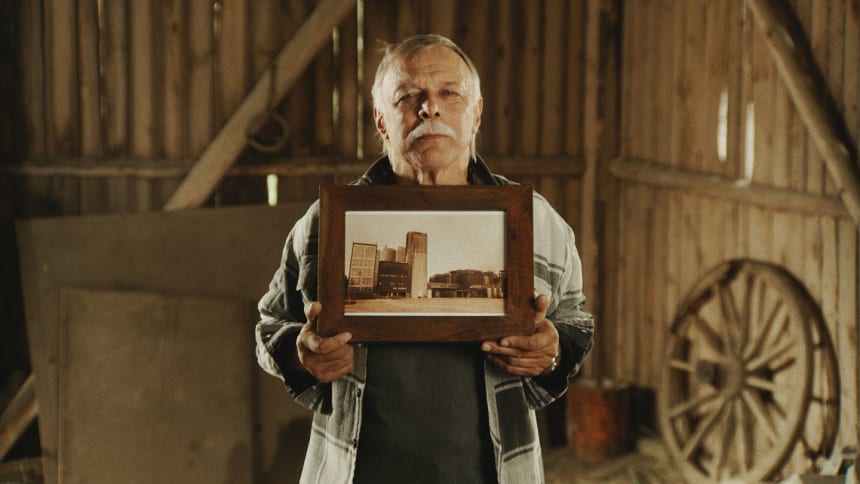 Koskenkorva farmer with a picture