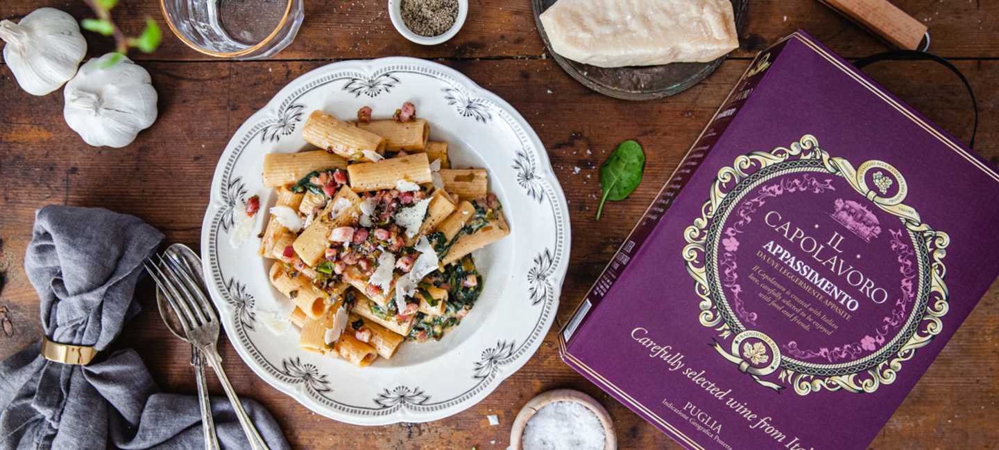 Pasta med pancetta och Il Capolavoro på box.