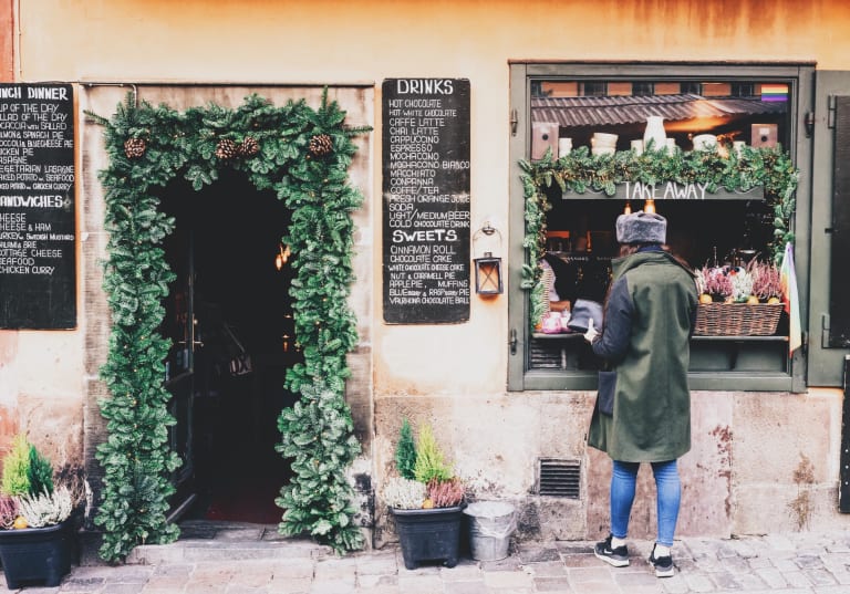 Girl in front of a boutique