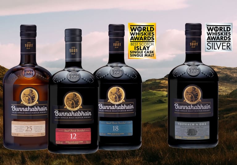 Bunnahabhain 12, 18, 25 years och  Toiteach A Dhà med landskap i bakgrund