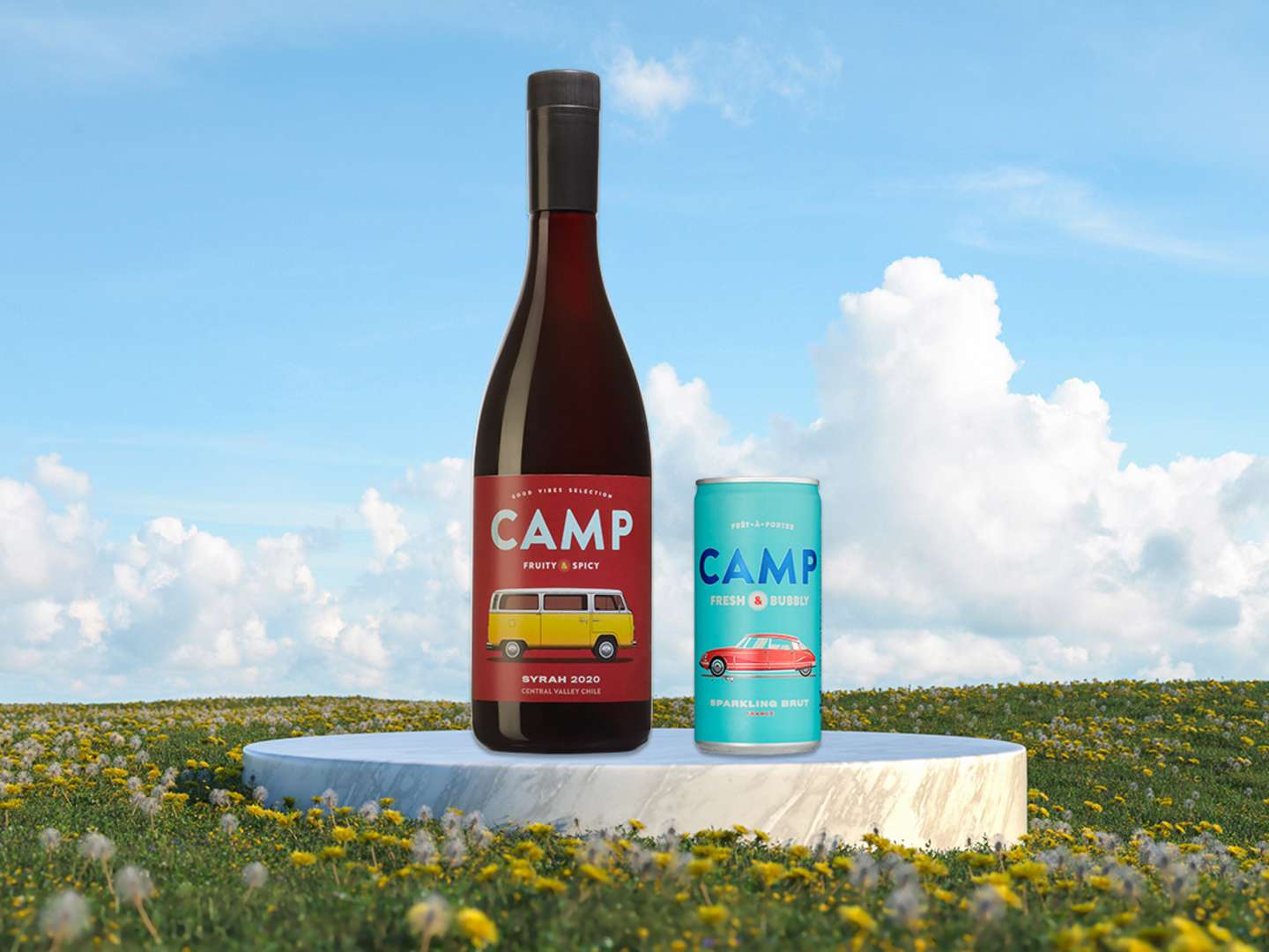 CAMP Syrah och CAMP Sparkling Brut på en sommaräng.