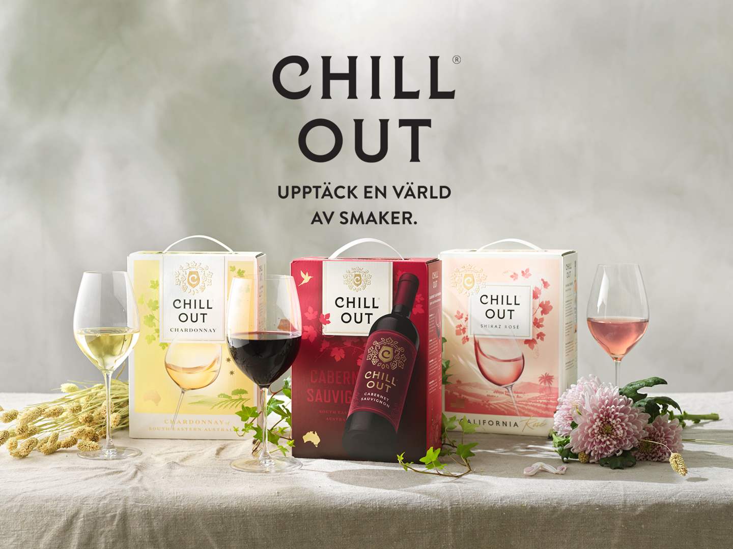 Chill Out tre vinboxar på ett bord.