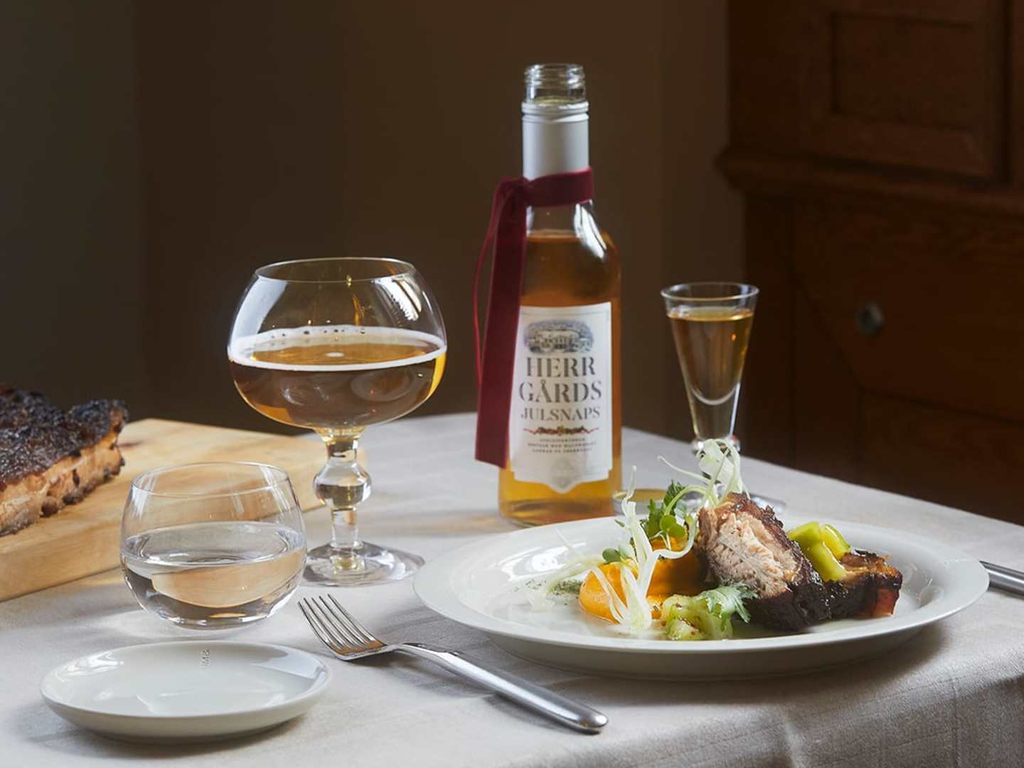 Herrgårds Julsnaps till Apelsinkryddad fläsksida