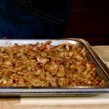 Add bacon to caramelized onions
