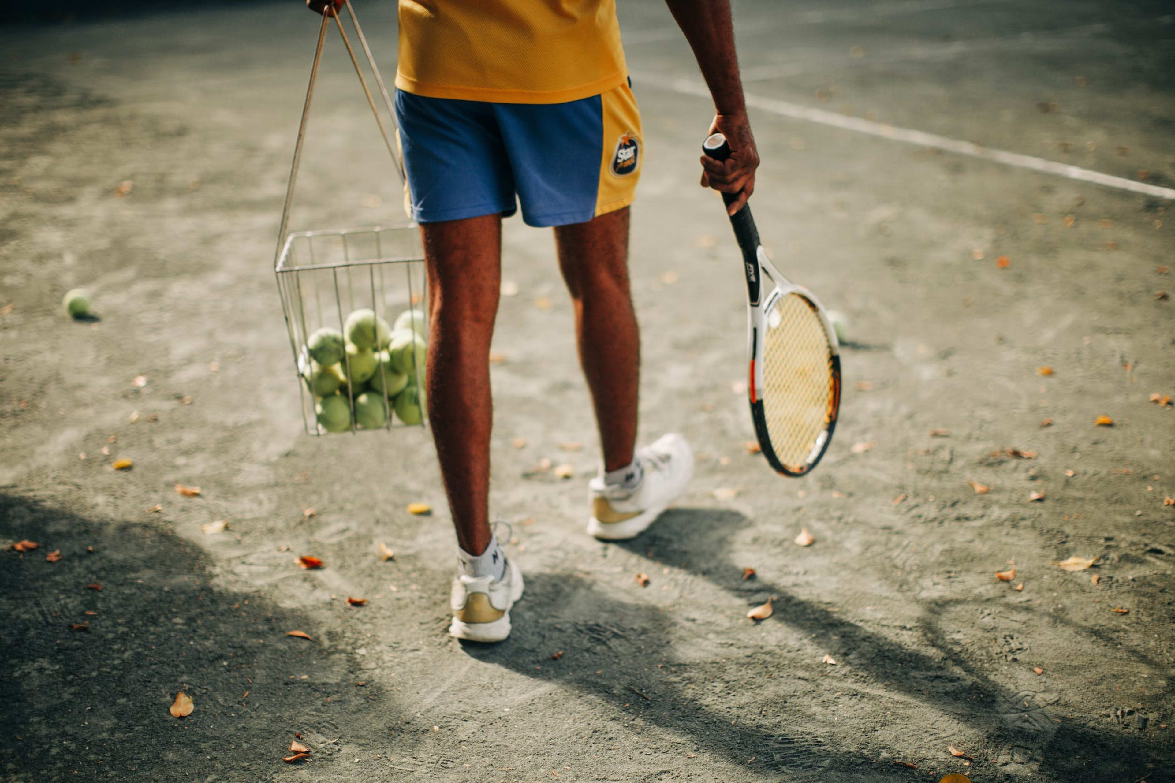 person holding tennis racket