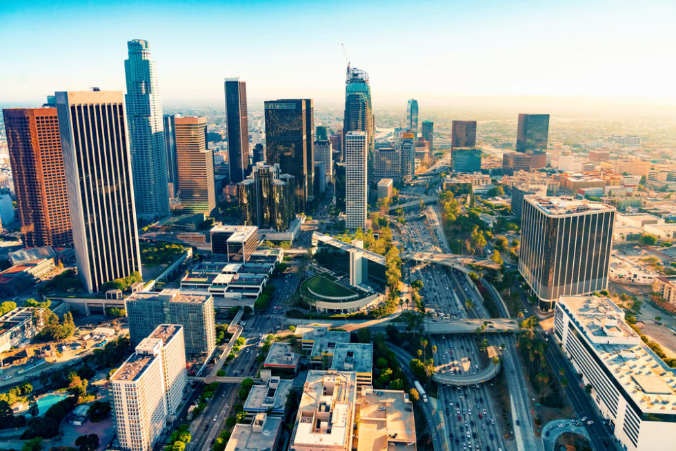  Aerial view of a Downtown Los Angeles at sunset