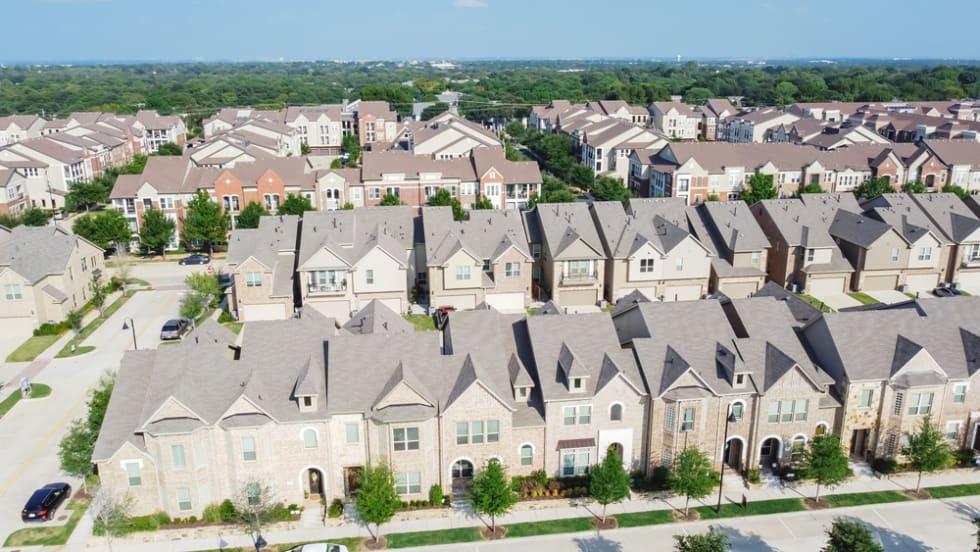 Aerial view of brand new two story condo and townhomes in downtown Flower Mound, Texas, America. 