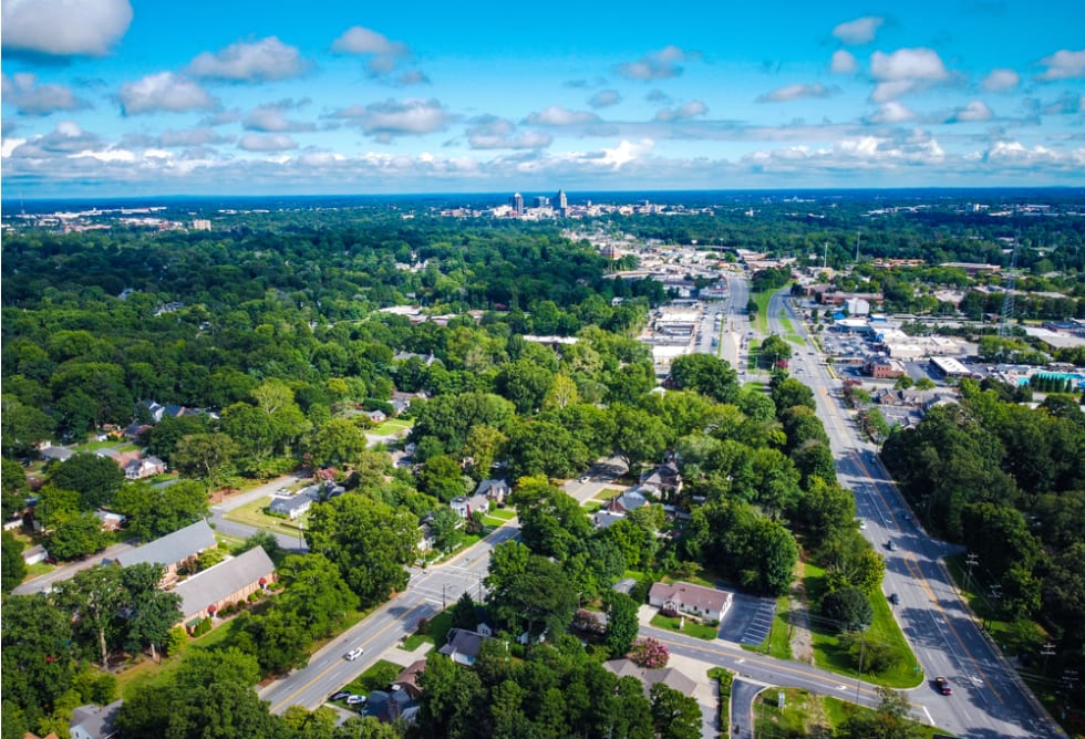  A high angle shot of Greensboro on a partly cloudy day