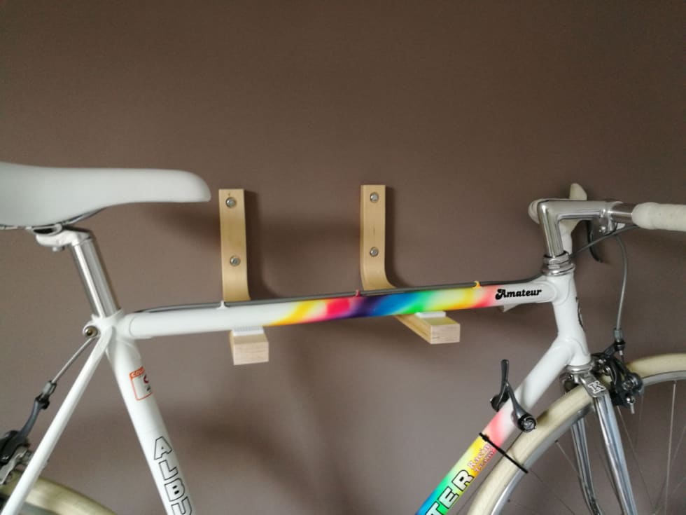 A close up of a bike mount made using IKEA Frosta stool legs