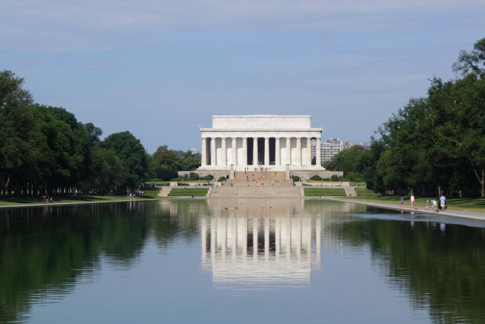 the Lincoln memorial in Washington DC with its reflection in the water