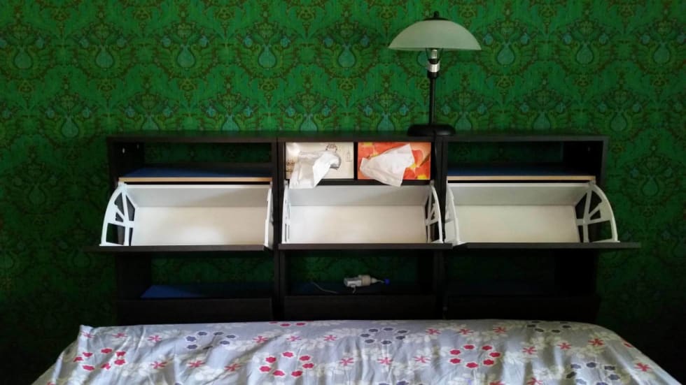 A headboard with storage using IKEA shoe cabinet