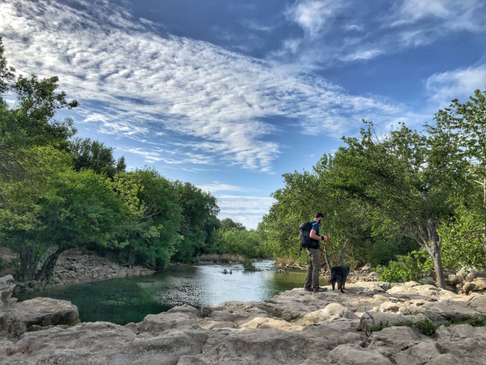 Hiked with dog in Barton Creek Greenbelt in Austin Sculpture Falls Hike on a sunny day