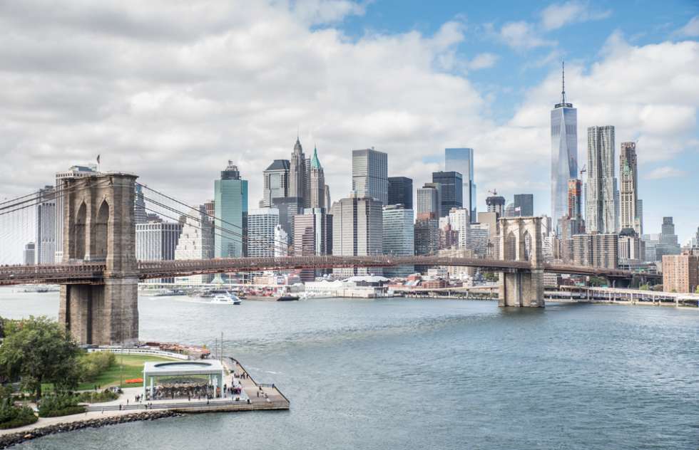 View of Brooklyn Bridge and Manhattan skyline - New York City downtown, photographed from Manhattan Bridge