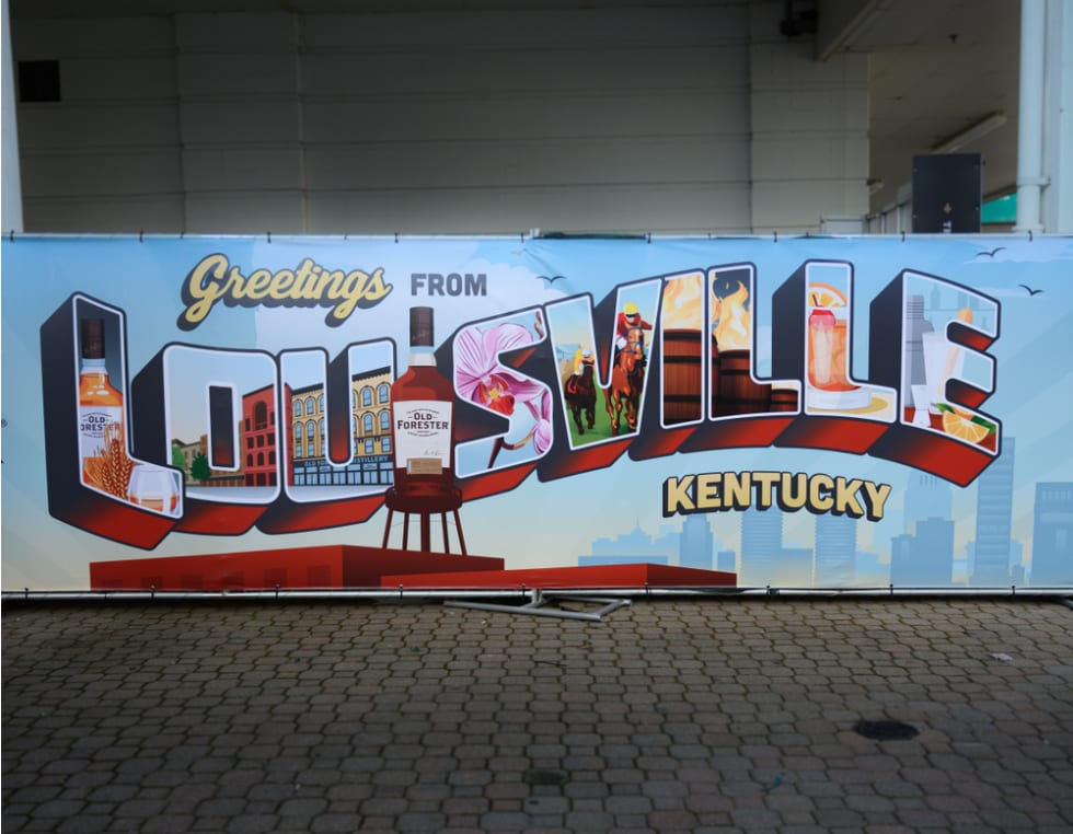 Greetings from Louisville sign welcomes visitors