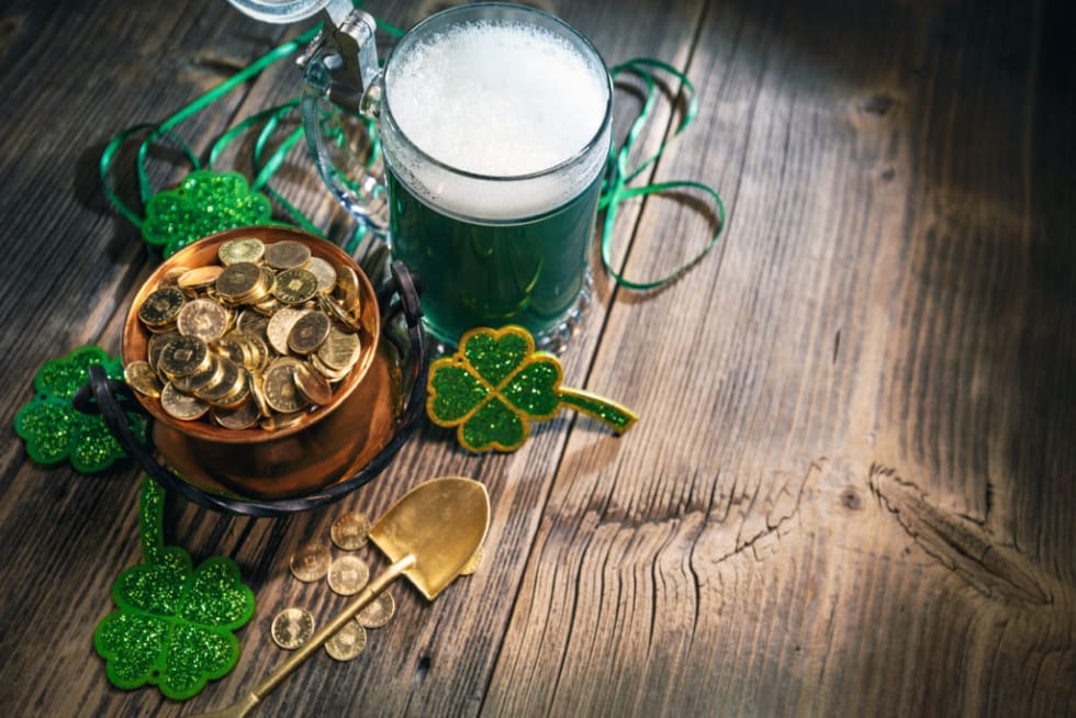 Green beer and pot of gold coins