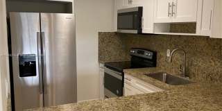 6090 W 18th Ave 6090 W 18th Ave Photo Gallery 1