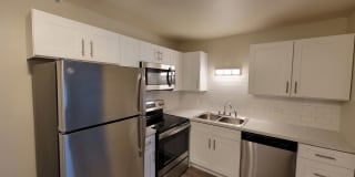 Updated Apartment With NEW KITCHEN & BATH With Balcony/Patio/Private Parking! Updated Apartment With NEW KITCHEN & BATH With Balcony/Patio/Private Parking! Photo Gallery 1