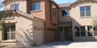 10110 West Albeniz Place 10110 West Albeniz Place Photo Gallery 1