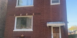 1006 S MENARD Avenue 1006 S MENARD Avenue Photo Gallery 1