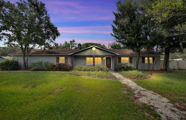 Photo of 4 BEDROOM POOL HOME ON ALMOST 1/2 ACRE! BRING YOUR TOYS..