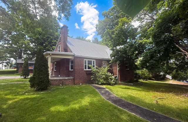 Spacious 4BR/2BA Two-Story Home with Basement, Hardwood Floors & Pet-Friendly Living