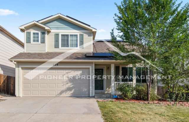 Photo of Spacious 4-Bed, 3.5-Bath Home with Walkout Basement, Oversized Deck enclosed yard, AC and 2-Car Garage and Solar Panels