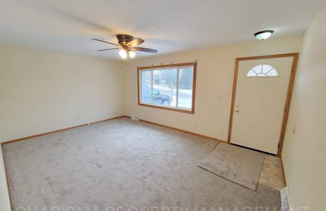 4 BD, 2 BA - FENCED IN YARD, PRIVATE TRAILS, FINISHED UPPER AND LOWER LIVING AREAS, ATTACHED GARAGE!