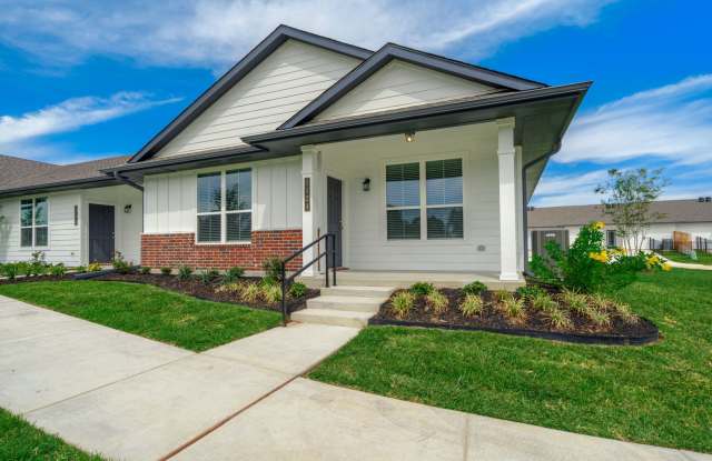 Photo of Live, love, and grow in this charming townhome!